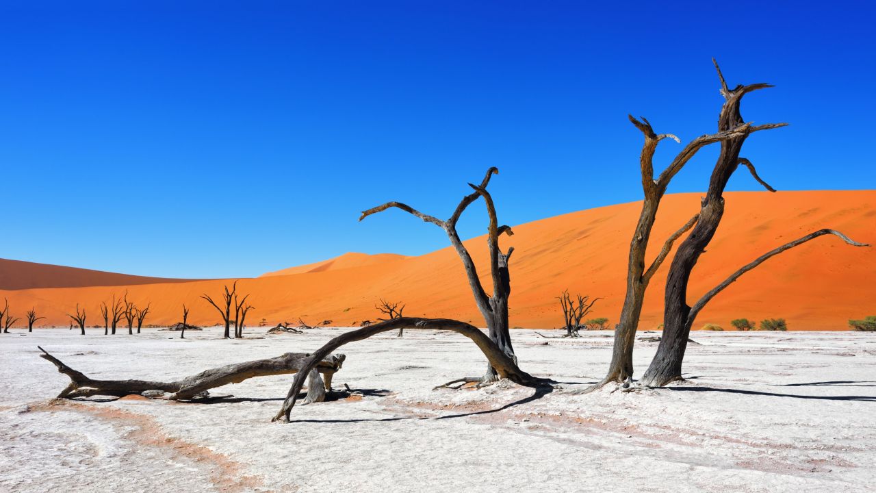 <strong>Sossusvlei Dunes, Namibia:</strong> Who knew sand could be stunning?  Found in Namib-Naukluft National Park, this stark stretch is known for its large, red sand dunes and is one of Namibia's most popular attractions.