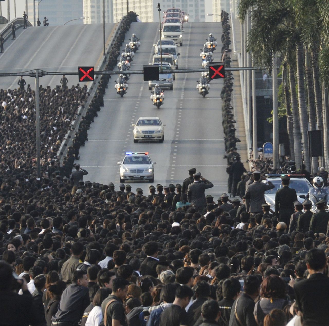 A van carries the body of Thai King Bhumibol Adulyadej's to his palace in Bangkok on October 14.