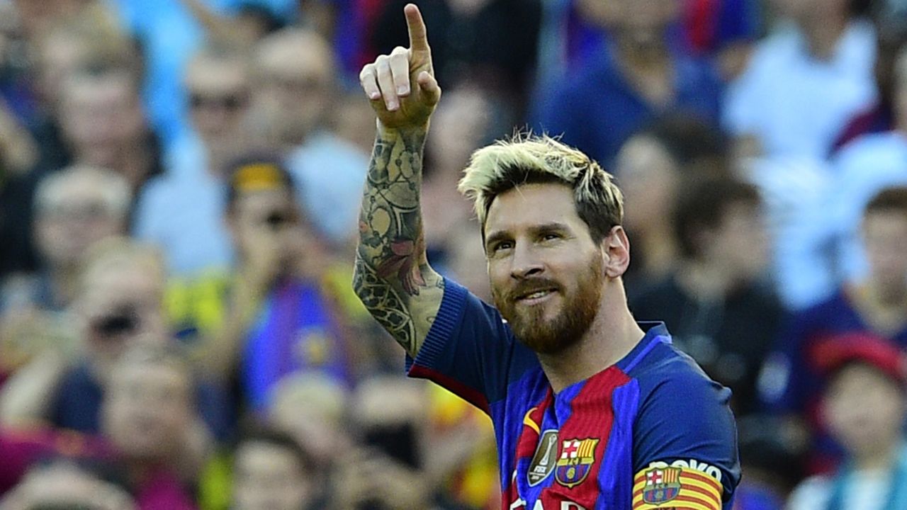 Lionel Messi celebrates scoring on his return from injury.