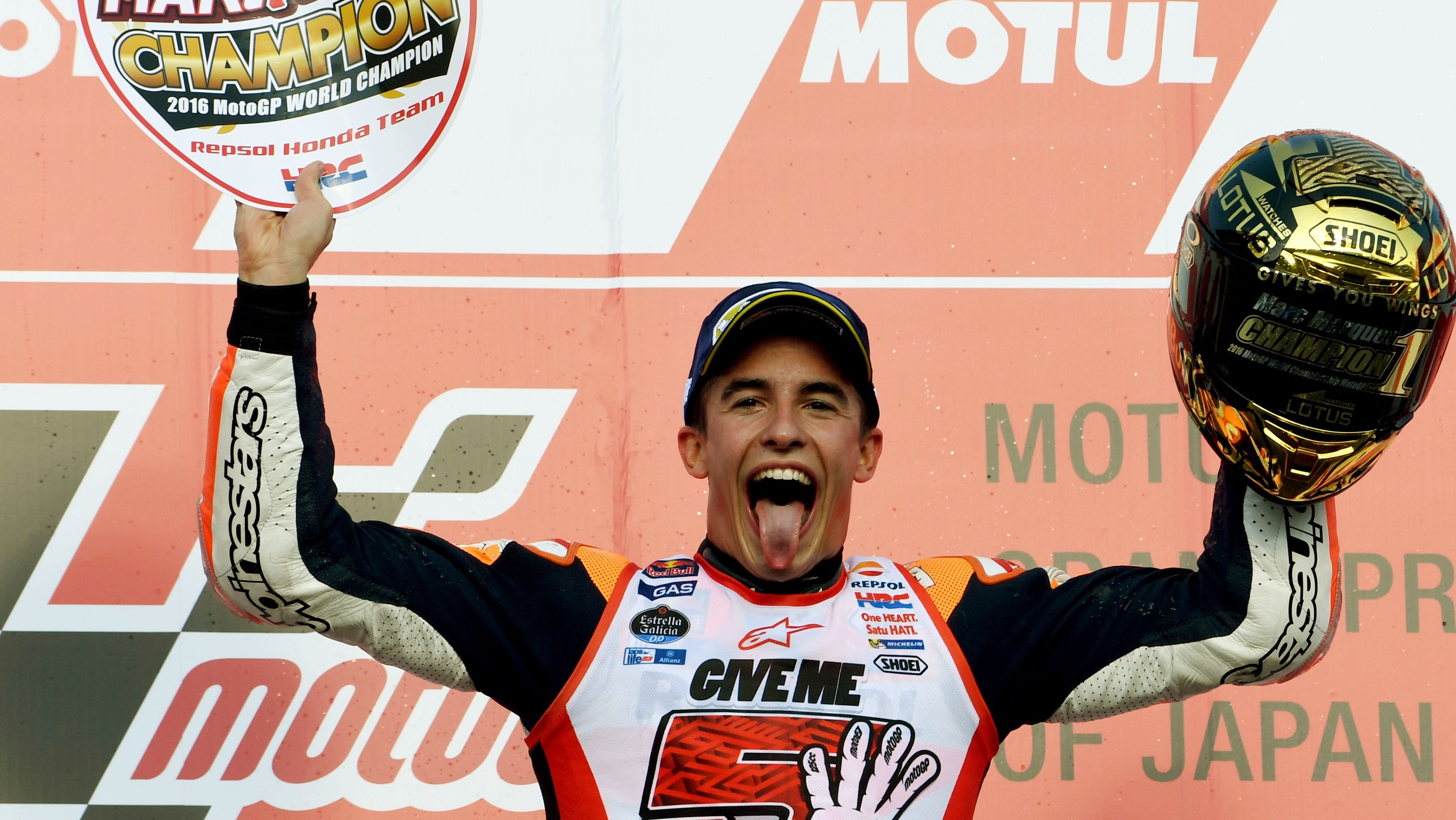 Spain's Marc Marquez celebrates his title winning victory at the Japanese MotoGP at Motegi.