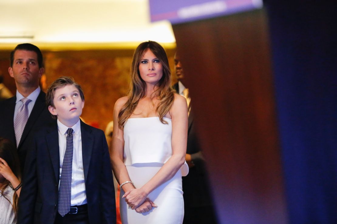 Melania and Barron Trump listen from the wings as Donald Trump announces he will run for the US presidency. 