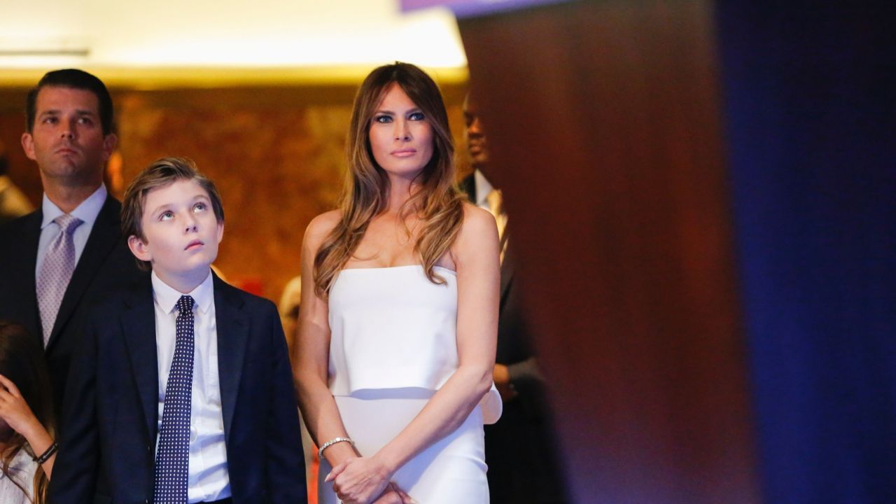 Melania and Barron Trump listen from the wings as Donald Trump announces he will run for the US presidency. 
