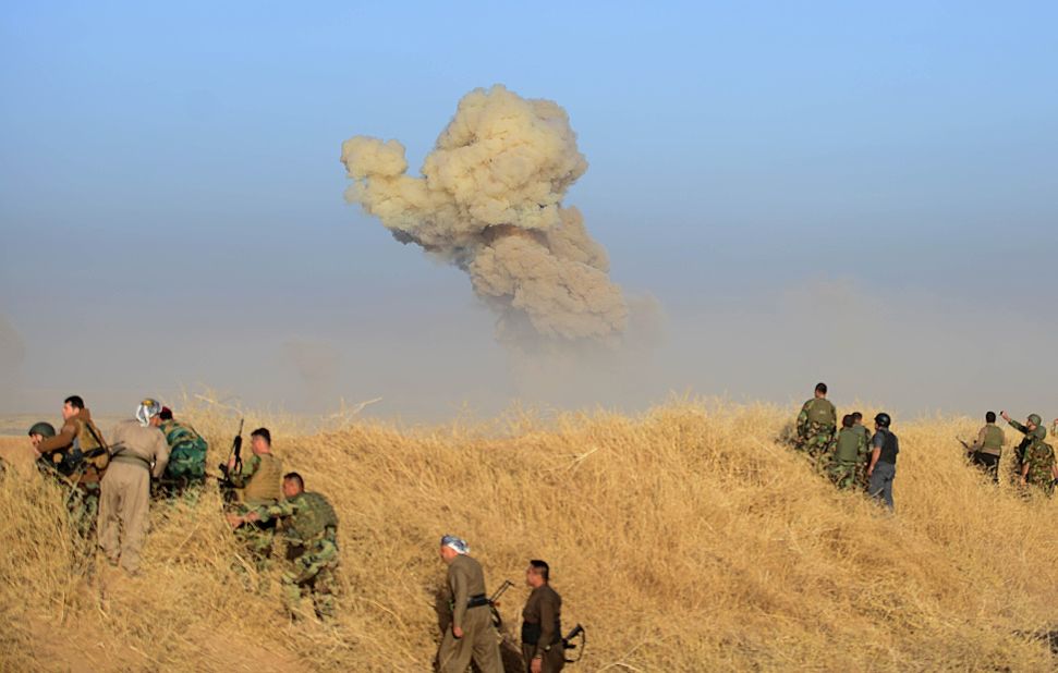 Smoke rises from a suicide car bomb attack carried out by ISIS in the village of Bedene on October 17.