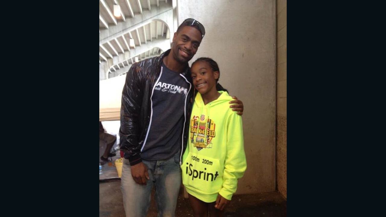 Tyson Gay poses with daughter Trinity in a photo he posted to his Twitter account in 2013.