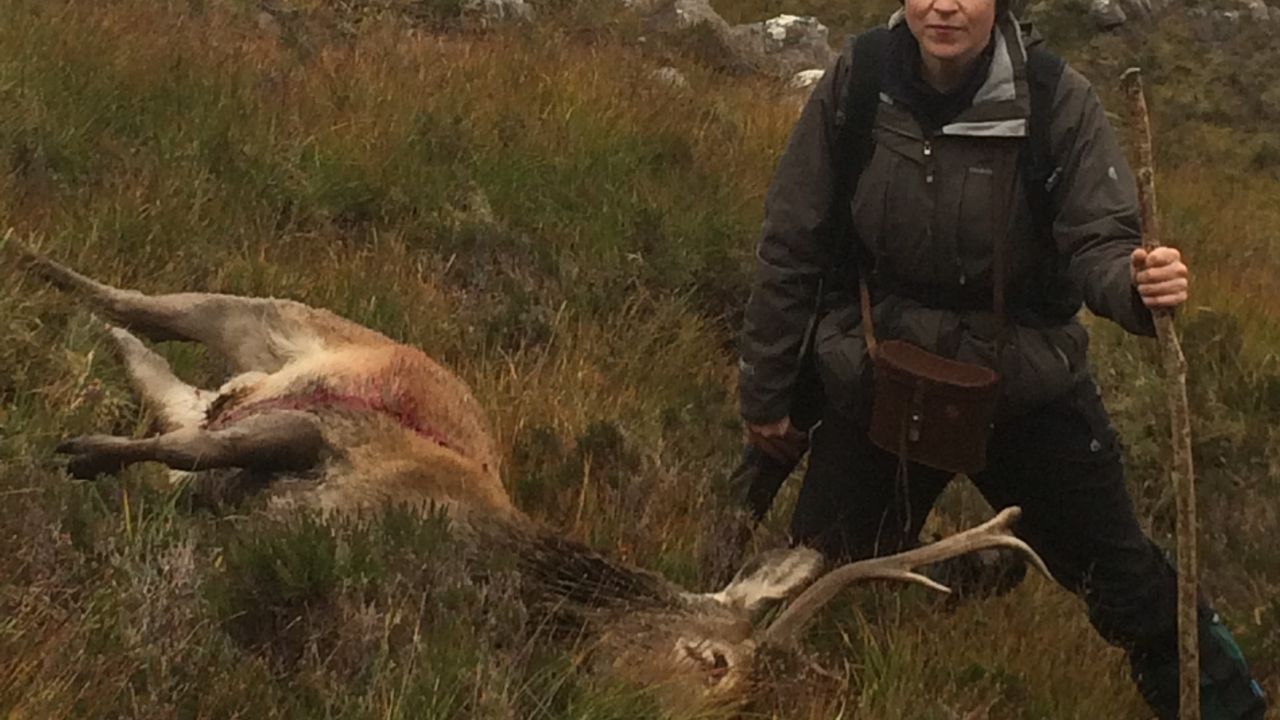 Louise Gray with her final kill - a Scottish stag.