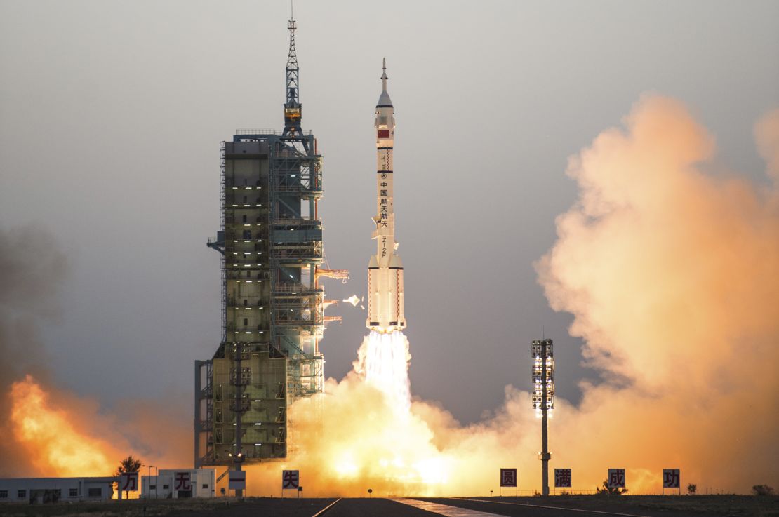 China's Shenzhou 11 spaceship onboard a Long March-2F carrier rocket takes off from the Jiuquan Satellite Launch Center in northwest China's Gansu province on Monday Oct. 17, 2016.