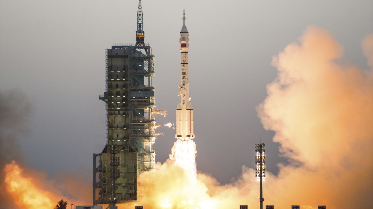 China's Shenzhou 11 spaceship onboard a Long March-2F carrier rocket takes off from the Jiuquan Satellite Launch Center in northwest China's Gansu province on Monday Oct. 17, 2016.