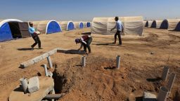 Workers build shelters to house civilians, who are expected to flee the violence in the northern city of Mosul as a result of a planned operation to retake the Iraqi city from jihadists, in the Hasan Sham village, some 45 kilometres east of the city of Mosul, on October 6, 2016.
The United Nations and Iraqi government plan to set up a number of camps for displaced people in the Mosul area, ahead of a planned operation to retake the Iraqi city of Mosul from jihadists. / AFP / SAFIN HAMED        (Photo credit should read SAFIN HAMED/AFP/Getty Images)