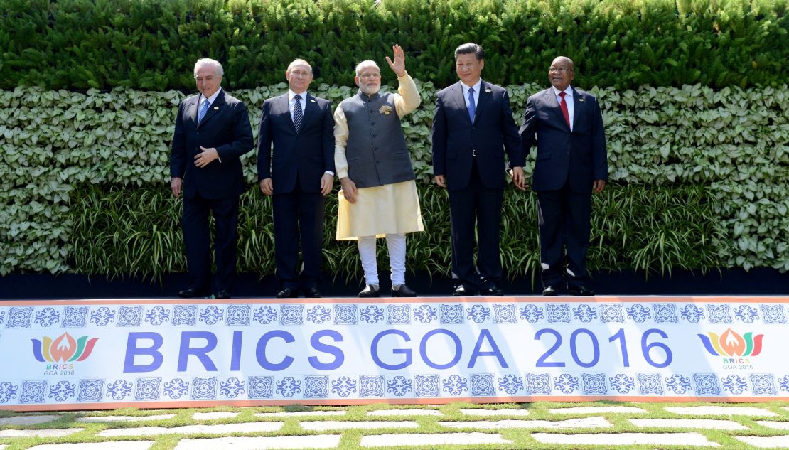 Brazilian President Michel Temer, Russian President Vladimir Putin, Indian Prime Minister Narendra Modi, Chinese President Xi Jinping and South African President Jacob Zuma pose for a group photo during the BRICS Summit in Goa on October 16, 2016.