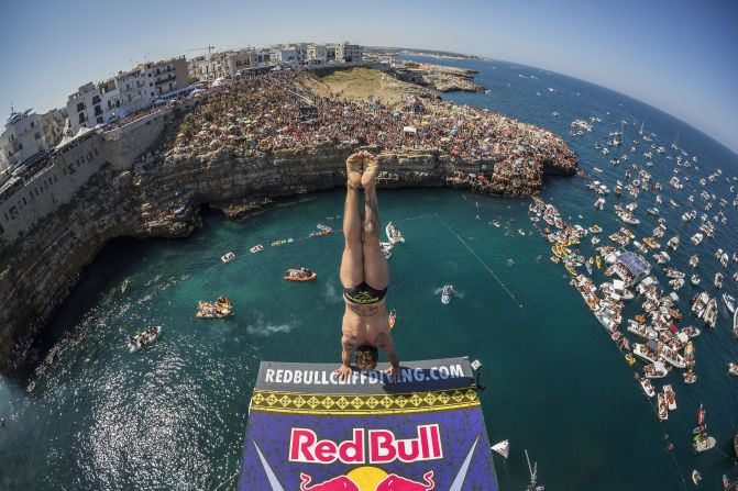 Alessandro de Rose prepares an armstand dive from the 27-meter platform during August's event. The Italian wildcard entry finished fourth, as Russia's Artem Silchenko ended Hunt's winning run.