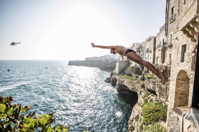 Mexican diver Jonathan Paredes, who finished third, launches himself from the city walls.