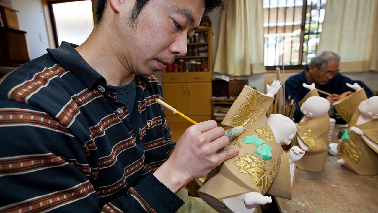 The future of Hakata doll-making rests on the shoulders of people such as 42-year-old Manabu Hayashi, Takeyoshi's apprentice for the last six years. "My friends were surprised when I changed careers," says Hayashi with a laugh, "but when they saw my passion they supported me. My master has been very patient. The relationship between teacher and student is very important."
