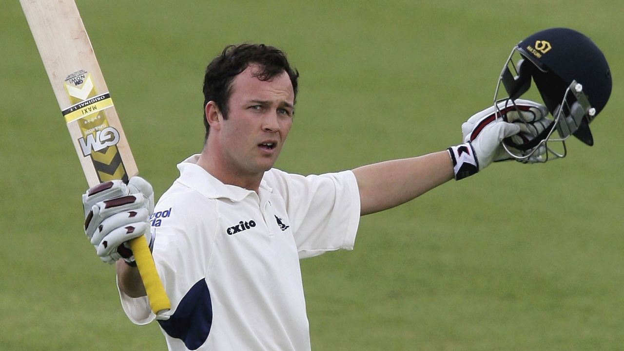 BIRMINGHAM, UNITED KINGDOM-APRIL 28: Warwickshire batsman Jonathan Trott raises his bat after reaching his century during the third day of the Liverpool and Victoria Cricket County Championship Division One match between Warwickshire and Yorkshire at Edgbaston on April 28, 2006 in Birmingham, England.  (Photo by Stu Forster/Getty Images)