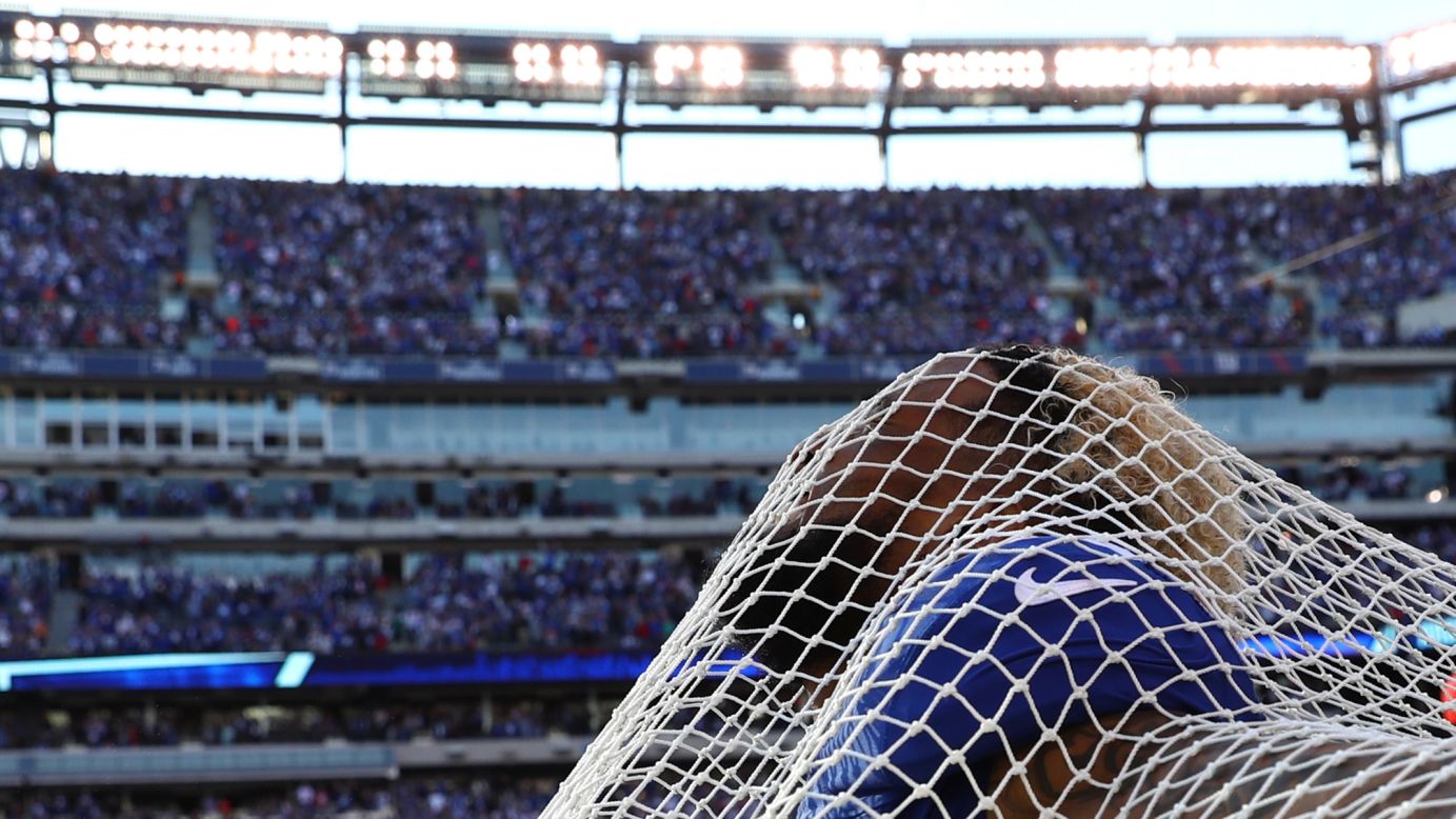 New York Giants wide receiver Odell Beckham sticks his head through a sideline kicking net after scoring the go-ahead touchdown against Baltimore on Sunday, October 16. Beckham and the net have had <a href="http://nypost.com/2016/10/16/odell-beckham-takes-the-plunge-with-kicking-net/" target="_blank" target="_blank">an interesting relationship,</a> to say the least. Beckham attacked the net in anger three weeks ago, and then he hugged the net to "make up" last week. This time around, he even got on one knee in a mock proposal.