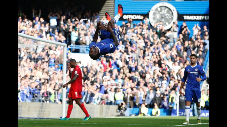 Chelsea midfielder Victor Moses flips after scoring a goal against Leicester City on Saturday, October 15. The match in London pitted the last two Premier League champions against each other. Chelsea won 3-0.