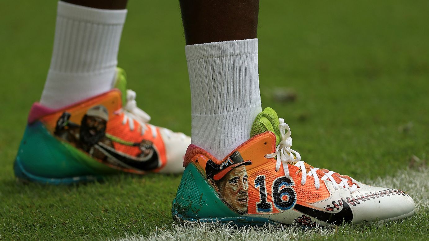 While playing an NFL game at Miami, Pittsburgh wide receiver Antonio Brown pays homage to two sports figures who passed away at an early age this year. On his cleats were <a href="http://www.cnn.com/2016/06/07/sport/kimbo-slice-death/" target="_blank">MMA fighter Kimbo Slice,</a> left, and baseball pitcher Jose Fernandez. Slice, 42, was an Internet sensation from the Miami area. Fernandez, 24, <a href="http://www.cnn.com/2016/09/25/us/mlb-pitcher-jose-fernandez-dead/" target="_blank">was an All-Star</a> with the Miami Marlins. 