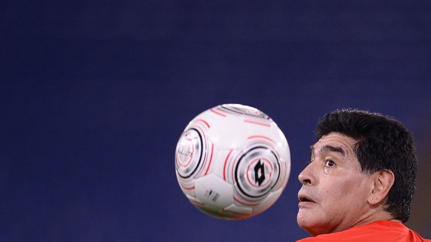 Argentine soccer legend Diego Maradona warms up before a charity match in Rome on Wednesday, October 12.