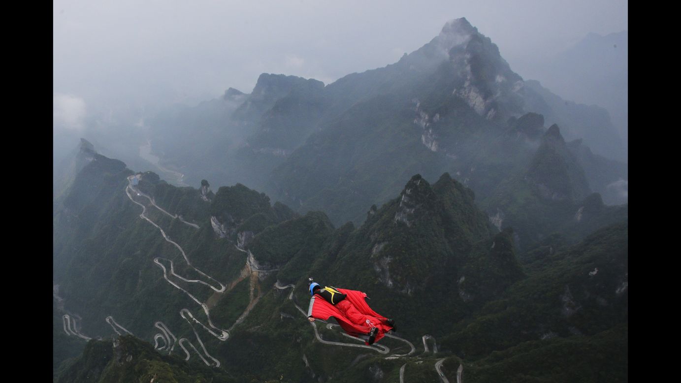 Gabriel Lott jumps off a mountain near Zhangjiajie, China, during the World Wingsuit Championship on Thursday, October 13.