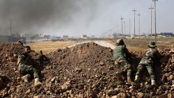 Kurdish security forces take up a position as they fight overlooking the Islamic State-controlled in villages surrounding Mosul, in Khazer, about 30 kilometers (19 miles) east of Mosul, Iraq, Monday, Oct. 17, 2016. Iraqi government and Kurdish forces, backed by U.S.-led coalition air and ground support, launched coordinated military operations early on Monday as the long-awaited fight to wrest the northern city of Mosul from Islamic State fighters got underway.(AP Photo)
