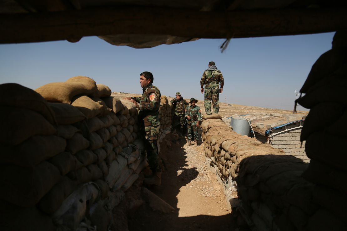 Peshmerga forces are seen at Naveran front during an operation in Nineveh, Iraq on Tuesday.