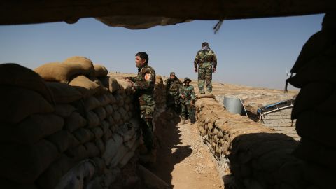 Peshmerga forces are seen at Naveran front during an operation in Nineveh, Iraq on Tuesday.