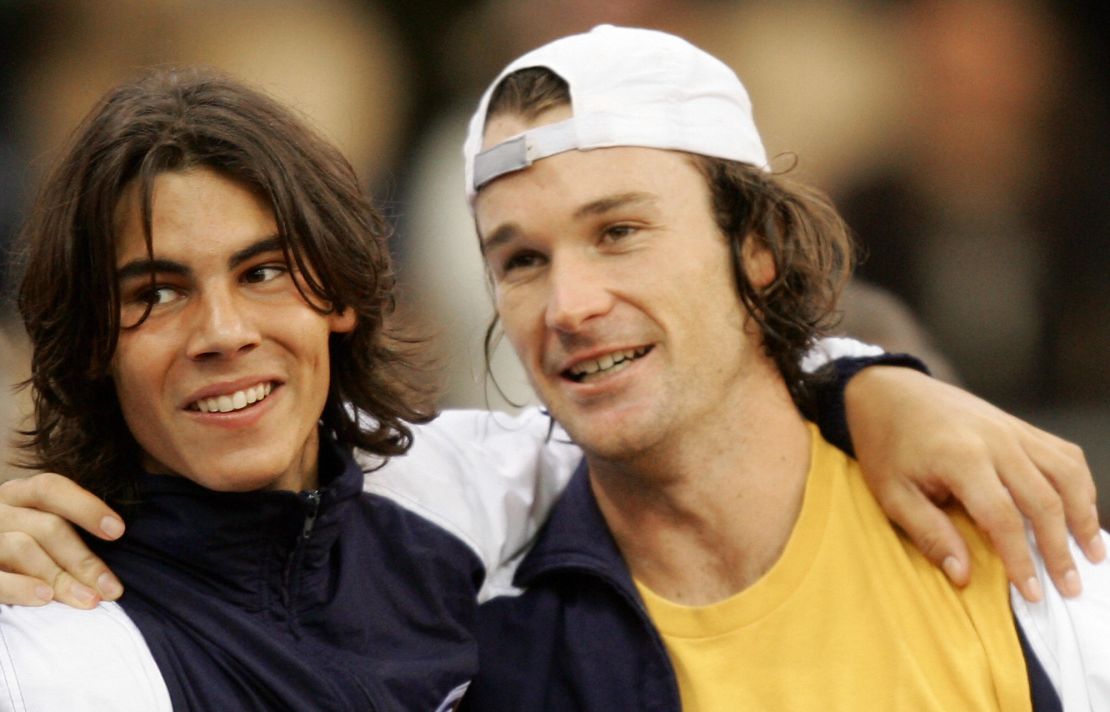 A teenage Nadal with Carlos Moya in 2004 after helping Spain win the Davis Cup title. 