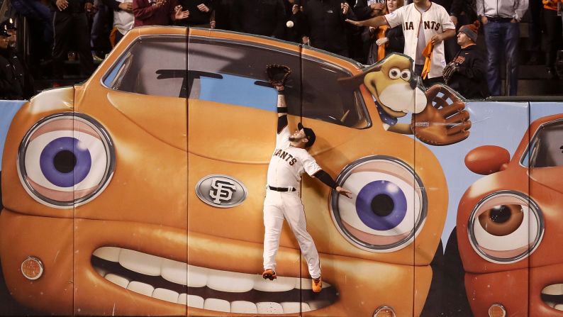 San Francisco outfielder Gregor Blanco can't prevent a Kris Bryant home run during Game 3 of the National League Division Series on Monday, October 10.