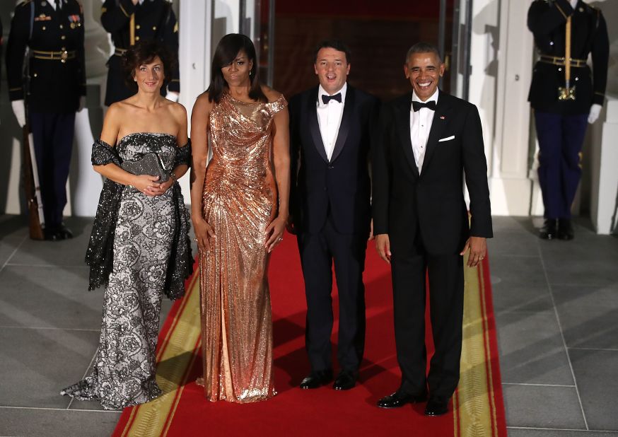 U.S. President Barack Obama and first lady Michelle Obama stand with Italian Prime Minister Matteo Renzi and his wife Mrs. Agnese Landini upon arrival for a state dinner at the White House, October 18, 2016 in Washington, DC. 