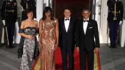 U.S. President Barack Obama and first lady Michelle Obama stand with Italian Prime Minister Matteo Renzi and his wife Mrs. Agnese Landini upon arrival for a state dinner at the White House, October 18, 2016 in Washington, DC.