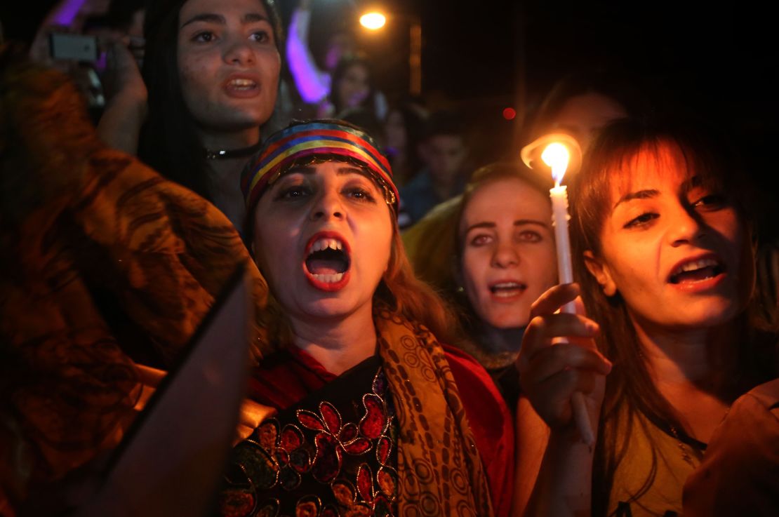 Iraqi Christians celebrate Tuesday in Irbil after Iraqi forces entered their hometown of Qaraqosh.