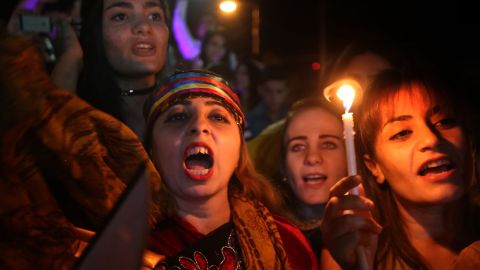 Iraqi Christians celebrate Tuesday in Irbil after Iraqi forces entered their hometown of Qaraqosh.