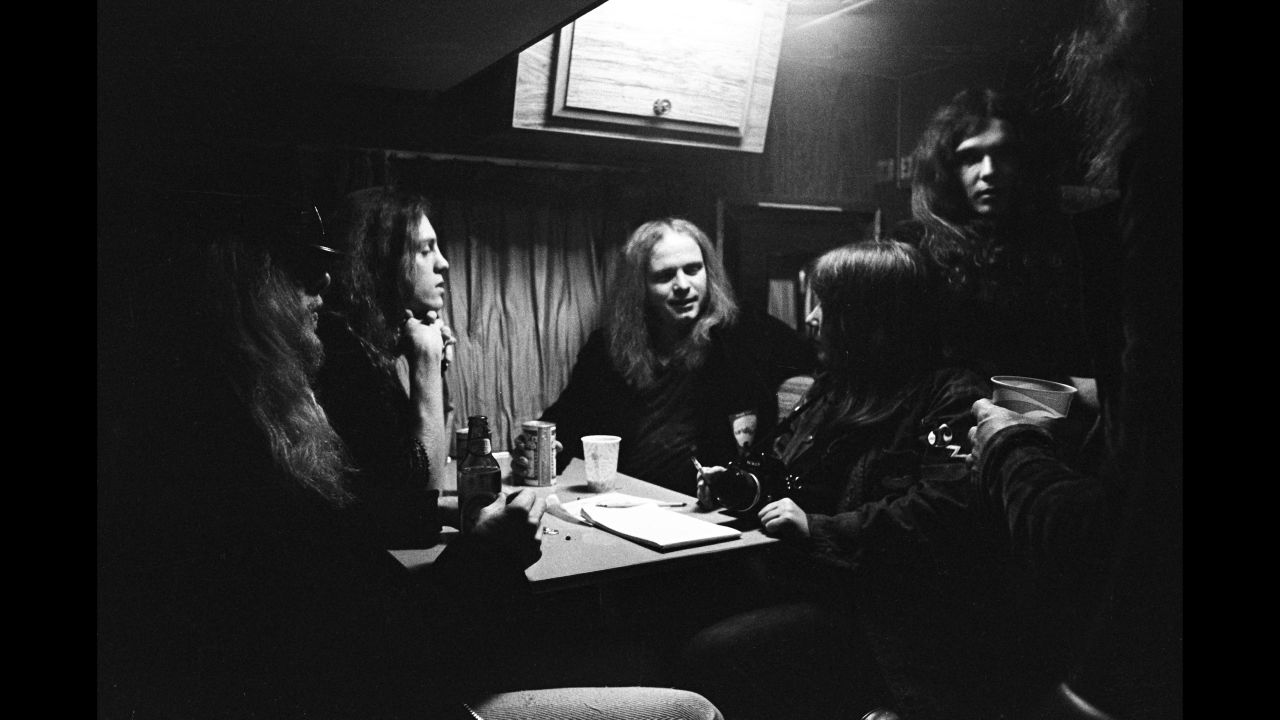 Members of the band party with friends in 1975.
