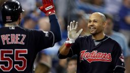 TORONTO, ON - OCTOBER 19:  Coco Crisp #4 of the Cleveland Indians celebrates with Roberto Perez #55 after hitting a solo home run in the fourth inning against Marco Estrada #25 of the Toronto Blue Jays during game five of the American League Championship Series at Rogers Centre on October 19, 2016 in Toronto, Canada.  (Photo by Elsa/Getty Images)