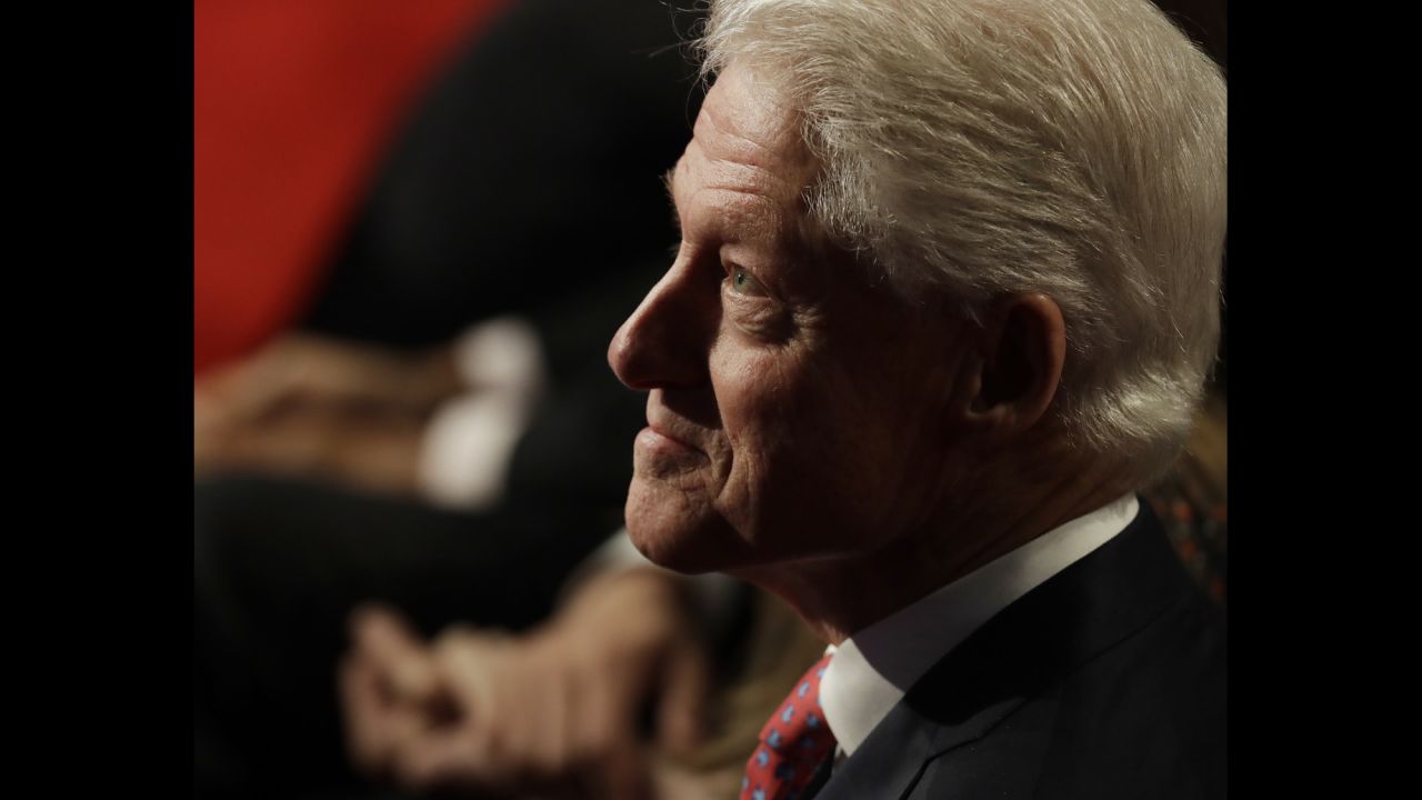 Bill Clinton waits for the third debate to start.