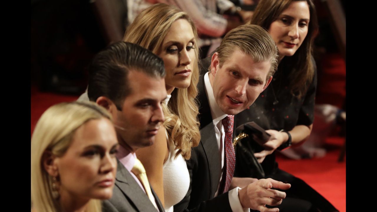 Trump's sons Eric and Donald Jr. wait for the debate to begin.