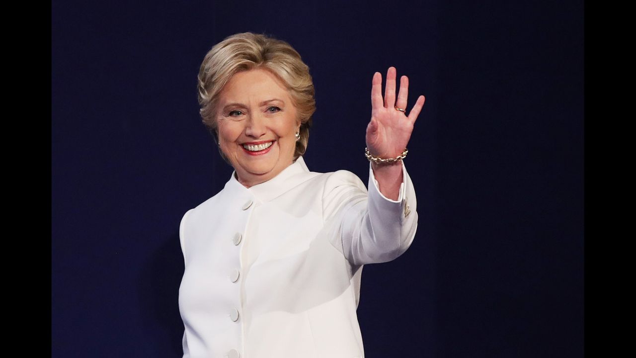 Clinton waves to the crowd before the debate.