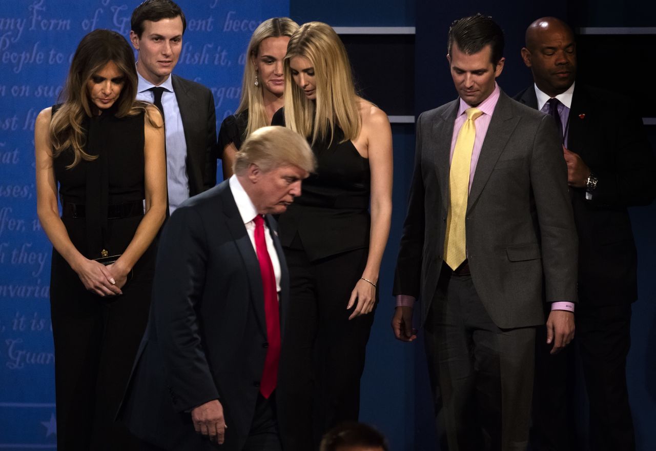 Republican nominee Donald Trump walks off stage with his family after the debate.