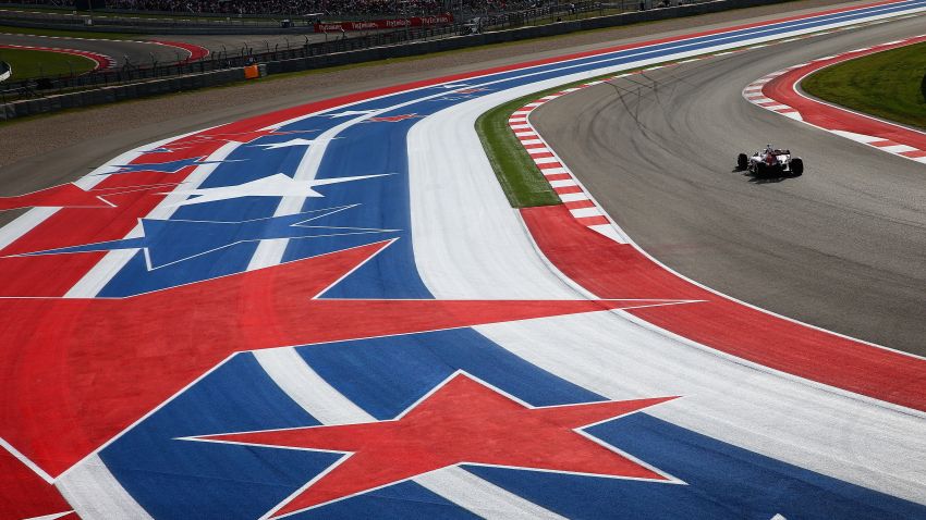 AUSTIN, TX - NOVEMBER 02:  Daniil Kvyat of Russia and Scuderia Toro Rosso drives during the United States Formula One Grand Prix at Circuit of The Americas on November 2, 2014 in Austin, United States.  (Photo by Clive Mason/Getty Images)