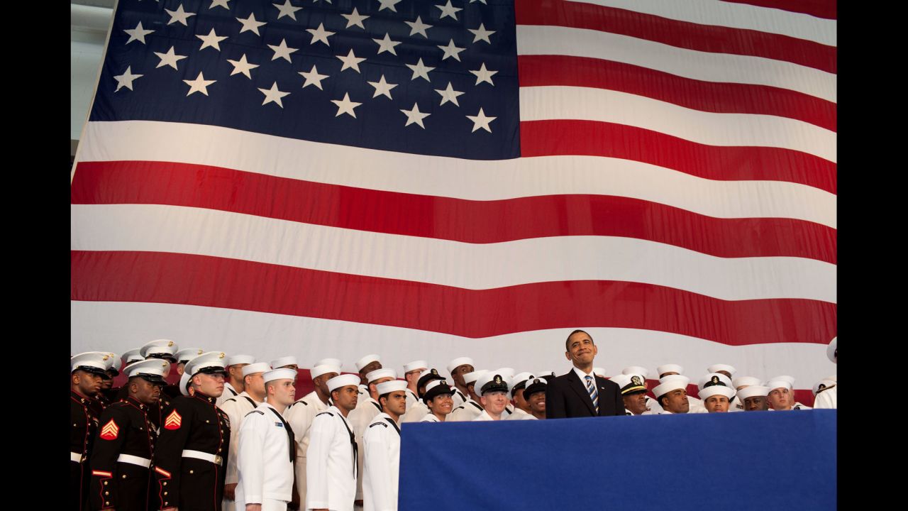 Obama stands on stage before delivering remarks to service members in Jacksonville, Florida, on October 26, 2009. "Of all the privileges I have as President, I have no greater honor than serving as your commander in chief," Obama said in his speech. 
