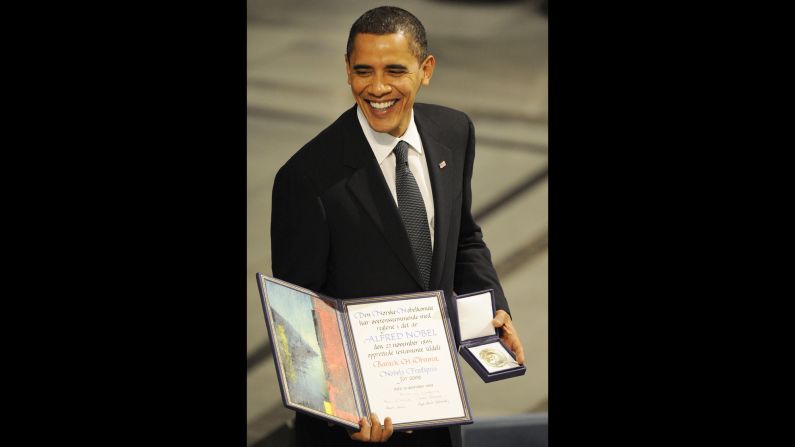 Obama poses with a diploma and gold medal after <a href="index.php?page=&url=http%3A%2F%2Fwww.cnn.com%2F2009%2FWORLD%2Feurope%2F10%2F09%2Fnobel.peace.prize%2Findex.html" target="_blank">accepting the Nobel Peace Prize</a> in Oslo, Norway, on December 10, 2009. The Norwegian Nobel Committee said it honored Obama for his "extraordinary efforts to strengthen international diplomacy and cooperation between peoples." Obama was the fourth U.S. President to win the Nobel Peace Prize. Theodore Roosevelt, Woodrow Wilson and Jimmy Carter also received the award.