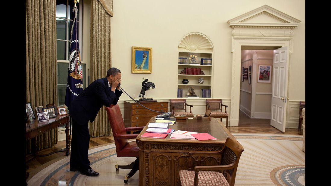 Obama calls a member of Congress to discuss health care reform on March 19, 2010. A bill passed the Senate in December 2009, but there were intense negotiations before it could pass the House. The bill passed 219-212 after more than a year of bitter partisan debate. All 178 Republicans opposed it, along with 34 Democrats.