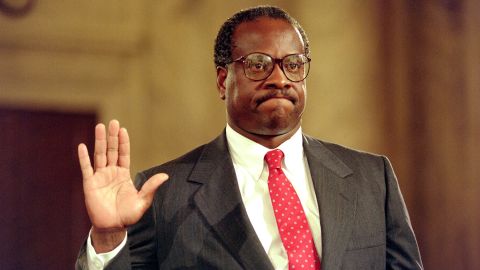 US Supreme Court nominee Clarence Thomas raises his right hand as he is sworn in on Sept. 10, 1991, during confirmation hearings before the US Senate Judiciary Committee, in Washington, DC.