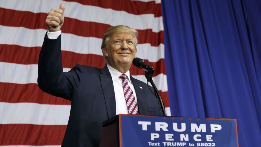 Republican presidential candidate Donald Trump gestures as he arrives to speak at a campaign rally at the Delaware County Fair, Thursday, Oct. 20, 2016, in Delaware, Ohio. (AP Photo/ Evan Vucci)