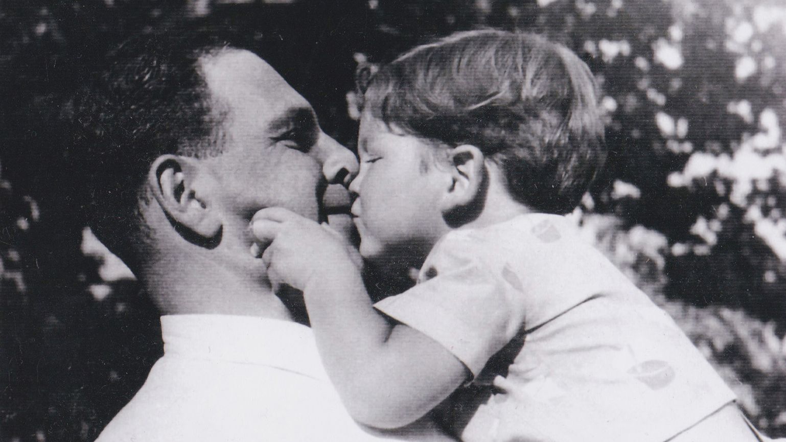 John with his father just before World War II. His father was was killed in 1944 by Hungarian Nazis when John was 6.