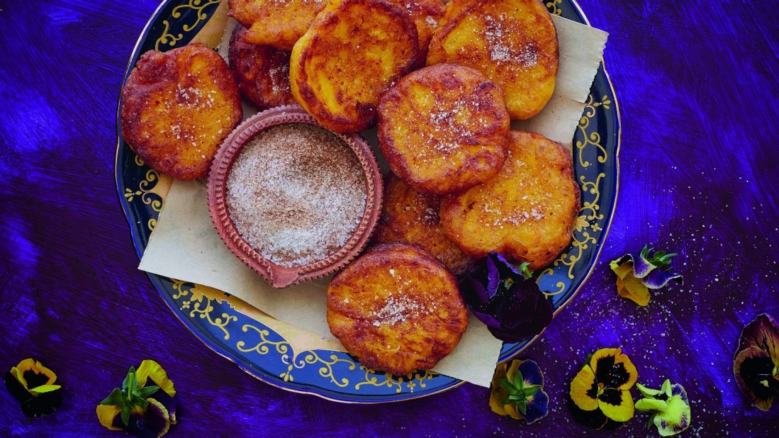 These pumpkin vetkoekies, or fritters, are a sweet after-dinner treat made from mashed pumpkin seasoned with vanilla and sprinkled with cinnamon sugar. 