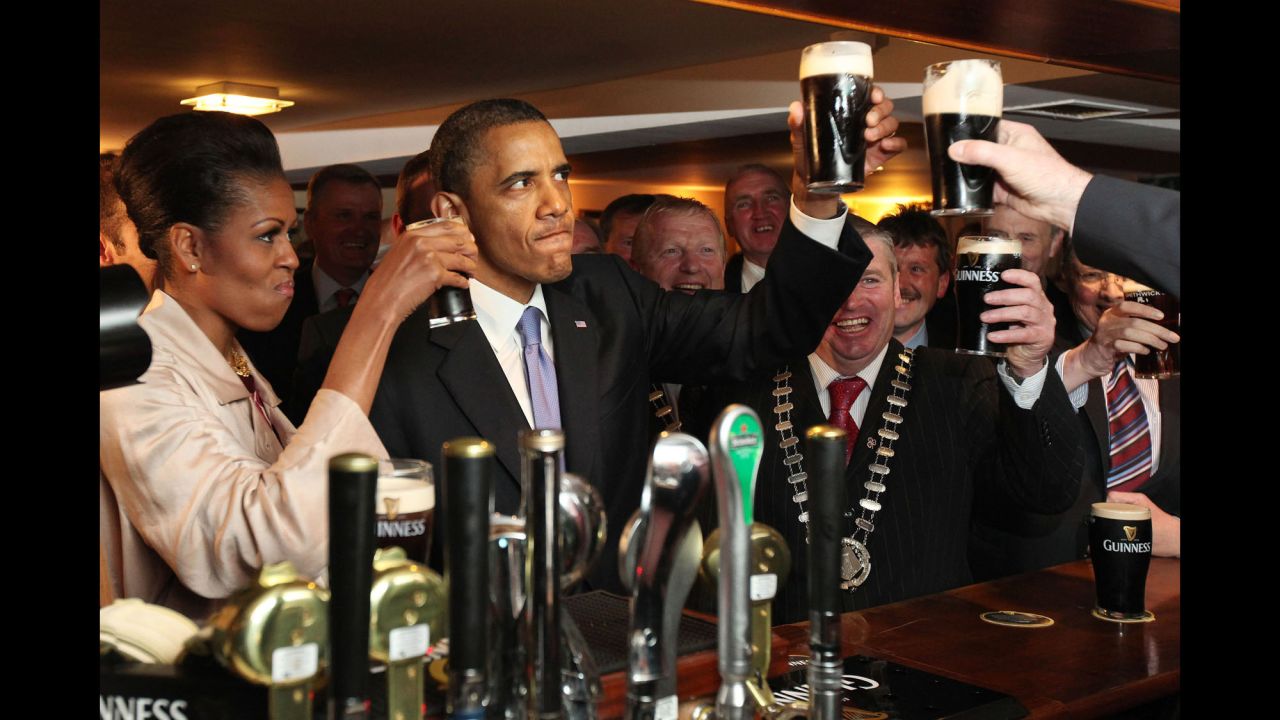 Obama and the first lady enjoy a glass of Guinness as they <a href="http://www.cnn.com/2011/POLITICS/05/23/obama.ireland/" target="_blank">visit his ancestral home</a> of Moneygall, Ireland, on May 23, 2011. Moneygall is believed to be the birthplace of one of his great-great-great grandfathers.