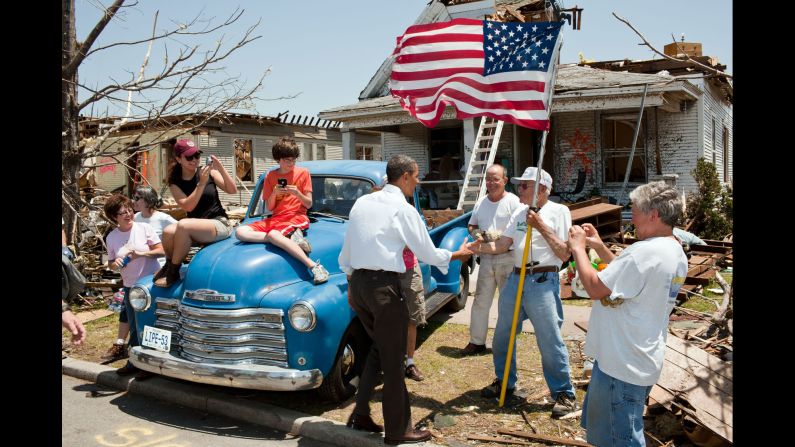 Obama greets Hugh Hills, 85, in front of Hills' tornado-damaged home in Joplin, Missouri, on May 29, 2011. It was <a href="index.php?page=&url=http%3A%2F%2Fwww.cnn.com%2F2016%2F05%2F22%2Fus%2Fjoplin-tornado-anniversary%2F" target="_blank">the deadliest tornado to hit American soil</a> since the National Weather Service began keeping records in 1950. Nearly 160 people were killed.