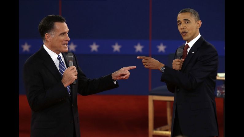 Obama faces off with Mitt Romney at a presidential debate in Hempstead, New York, on October 16, 2012. Obama <a href="index.php?page=&url=http%3A%2F%2Fwww.cnn.com%2F2012%2F11%2F06%2Fpolitics%2Felection-2012%2F" target="_blank">was re-elected</a> with 332 electoral votes to Romney's 206.