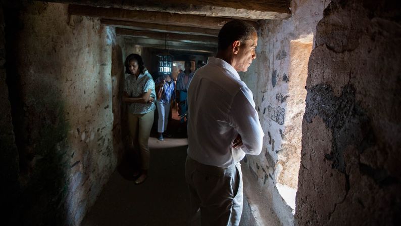 Obama and the first lady tour an old slave house on Senegal's Goree Island on June 27, 2013. It was part of a <a href="index.php?page=&url=http%3A%2F%2Fwww.cnn.com%2F2013%2F06%2F28%2Fpolitics%2Fgallery%2Fobama-in-africa%2F" target="_blank">three-nation tour in Africa.</a> "For an African-American -- and an African-American President -- to be able to visit this site, I think (it) gives me even greater motivation in terms of the defense of human rights around the world," Obama said.