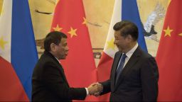 BEIJING, CHINA - OCTOBER 20: Philippine President Rodrigo Duterte, left and Chinese President Xi Jinping shakes hands after a signing ceremony on October 20, 2016 in Beijing, China. Philippine president Rodrigo Duterte is on a four-day state visit to China, his first since taking power in late June, with the aim of improving bilaterial relations.  (Photo by Ng Han Guan-Pool/Getty Images)